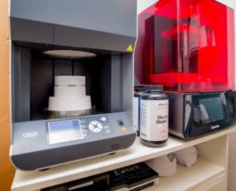 Shelf stocked with advanced dental technology